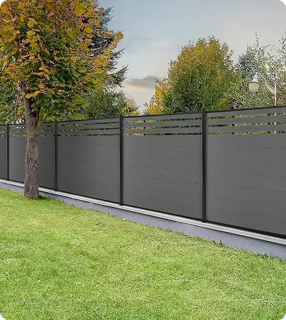 A fence with black panels on the side,